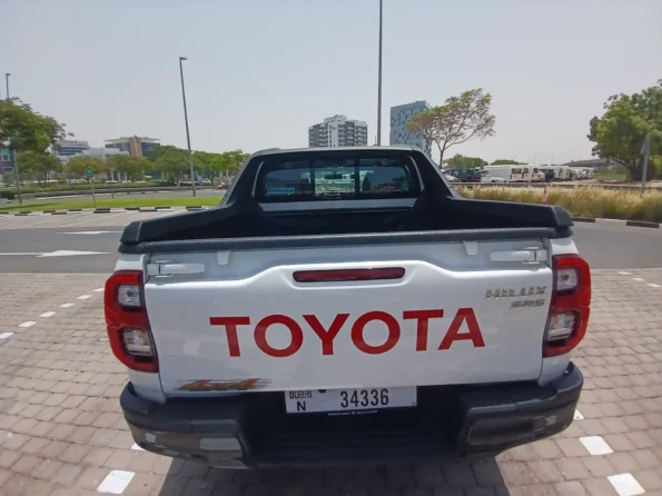Toyotahiluxrentaldubaibyproxluxuryrentalbackview min