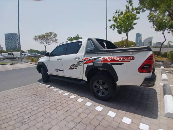 Toyotahiluxrentaldubaibyproxluxuryrentalsbacksideview min