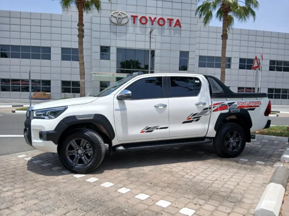 Toyotahiluxrentaldubaibyproxluxuryrentalssv min